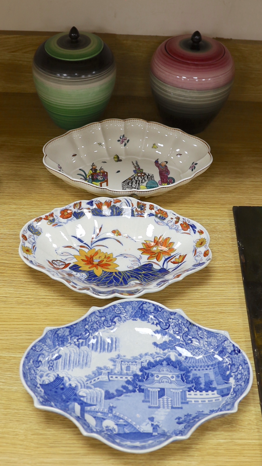 Two early 19th century pearlware lozenge dishes, a Royal Worcester dish and two Wedgwood jars and covers, blue and white dish 27.5cm wide